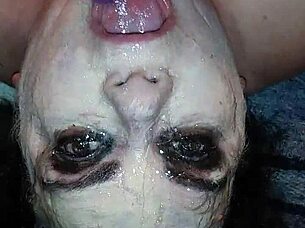 Ms TL takes dildo deep in throat.