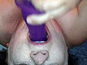 Ms TL takes dildo deep in throat.