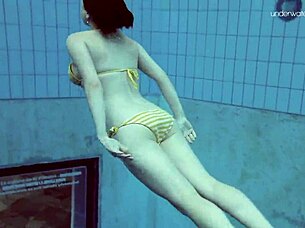 Lada Poleshuk Performs Underwater Show with Big Tits and Short Hair