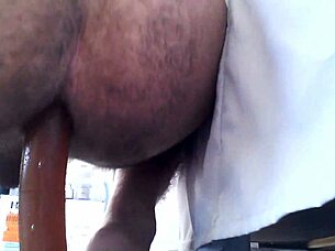 hey, watch this cuban gay guy using his toys on himself