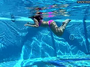 hot russian jessica lincoln relaxes in the pool, bikini on, looking so sexy