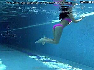 hot russian jessica lincoln relaxes in the pool, bikini on, looking so sexy