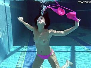 hot russian jessica lincoln relaxes in the pool, bikini on, looking so sexy