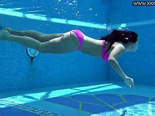 hot russian jessica lincoln relaxes in the pool, bikini on, looking so sexy