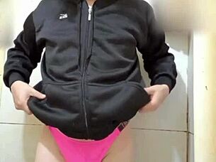 I see this sexy transsexual in thong panties and lingerie