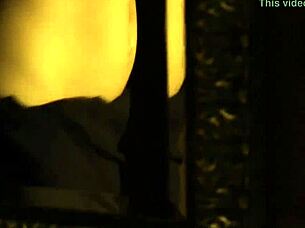 Happy Asian brunette dances nude in striptease