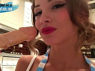 I am the lovely camgirl. I masturbate with a dildo in the kitchen until orgasm.