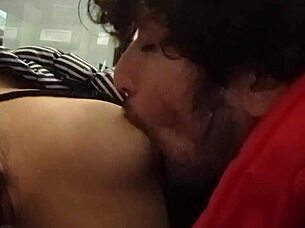 i suck her small tits at the outdoor atm in public