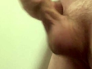 Horny employee masturbates at work, risking a cumshot in the office