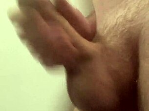 Horny employee masturbates at work, risking a cumshot in the office