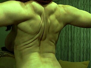 busty bodybuilder flexes passionately while riding and fucking intensely