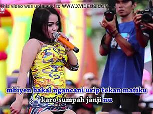 Two Pretty Indonesian Singers Perform Wild Erotic Dance On Stage Surrounded By Men