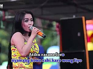 Two Pretty Indonesian Singers Perform Wild Erotic Dance On Stage Surrounded By Men