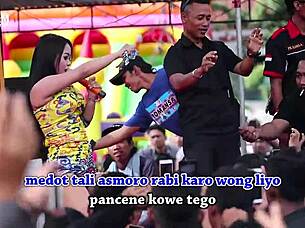 Two Pretty Indonesian Singers Perform Wild Erotic Dance On Stage Surrounded By Men