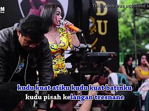 Two Pretty Indonesian Singers Perform Wild Erotic Dance On Stage Surrounded By Men