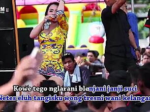 Two Pretty Indonesian Singers Perform Wild Erotic Dance On Stage Surrounded By Men