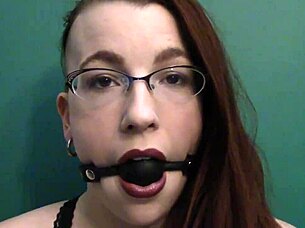 dark lipstick ballgag drooling with intense eye contact