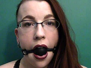 dark lipstick ballgag drooling with intense eye contact