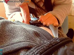 Stepbrother and stepsister assist each other outdoors in public setting