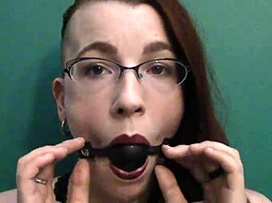 dark lipstick ballgag drooling with intense eye contact