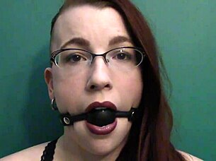 dark lipstick ballgag drooling with intense eye contact