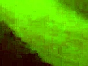 Stepbrother and stepsister assist each other outdoors in public setting