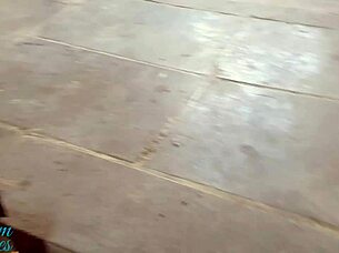 Stepbrother and stepsister assist each other outdoors in public setting