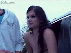 a girl sticks her butt out the car window for some public fun