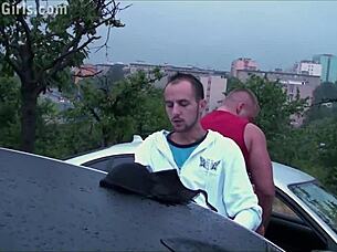 a girl sticks her butt out the car window for some public fun