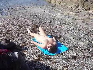 Exhibitionist Flashes Dick to Nudist Milf Who Sucks Him on Beach