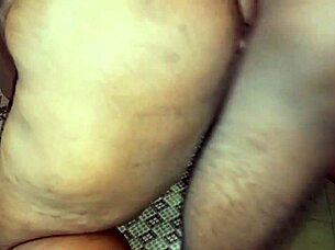 The wide black ass lady bends over for monster cock doggystyle