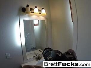 busty brett rossi performs a tease in her motel room