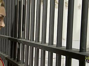 Prison nurse assists inmate in the jail facility