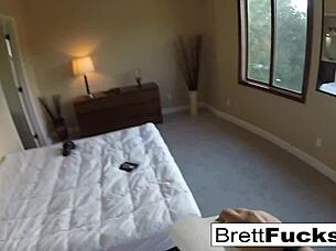 busty brett rossi performs a tease in her motel room