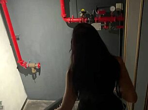 In a bustling restaurant, a girl performs a blowjob on her partner discreetly.