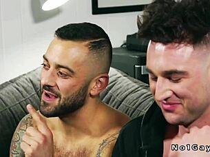 Tattooed muscular hunk intensely fucks pal's ass bareback.