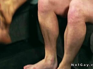 Tattooed muscular hunk intensely fucks pal's ass bareback.