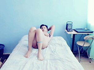 young hot gay guy touches himself in his room, exploring crossdressing fantasies