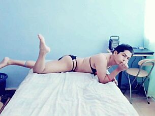 young hot gay guy touches himself in his room, exploring crossdressing fantasies