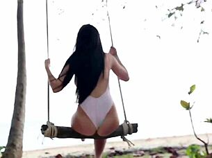 Solo girl Cassie strips naked on paradise beach outdoors