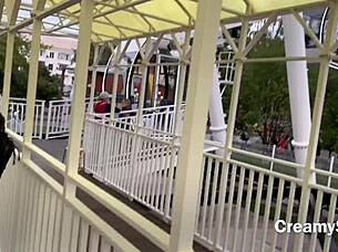 Swallow hot cum in risky public sex on ferris wheel, bent over with big tits.
