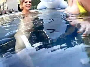 Angela White and friends enjoy pool time in big titty bikinis, sharing kisses and laughs.