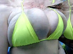 Angela White and friends enjoy pool time in big titty bikinis, sharing kisses and laughs.