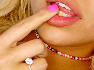 this adorable blonde is naked in the close-up interview.