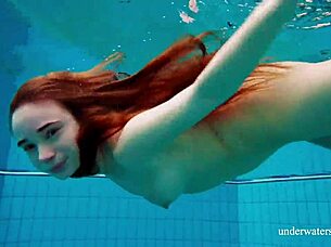 Nina Mohnatka boldly exposes her hairy pussy underwater in the shower