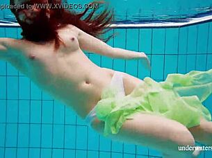 Nina Mohnatka boldly exposes her hairy pussy underwater in the shower