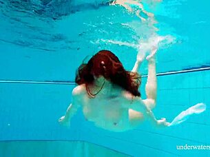 Nina Mohnatka boldly exposes her hairy pussy underwater in the shower