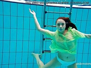 Nina Mohnatka boldly exposes her hairy pussy underwater in the shower