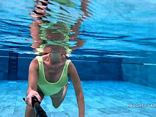 Milf Wife Wears Transparent Wet One-Piece Bikini In Public Pool, Flashing Exhibitionist Style.