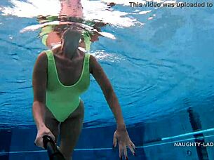 Milf Wife Wears Transparent Wet One-Piece Bikini In Public Pool, Flashing Exhibitionist Style.